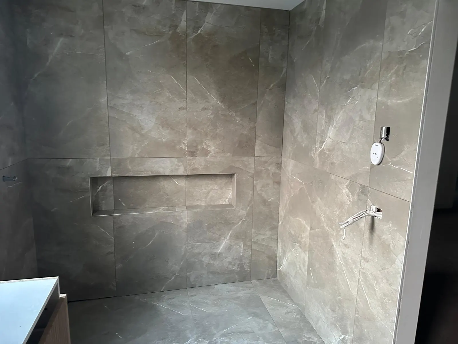 Living room stone and marble flooring